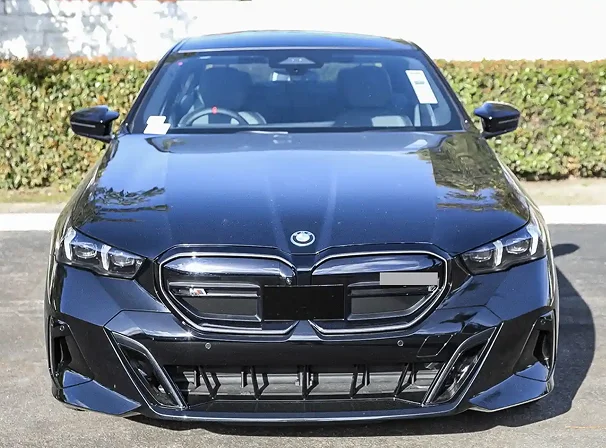 BMW i5 chauffeur UK executive electric saloon for private travel
